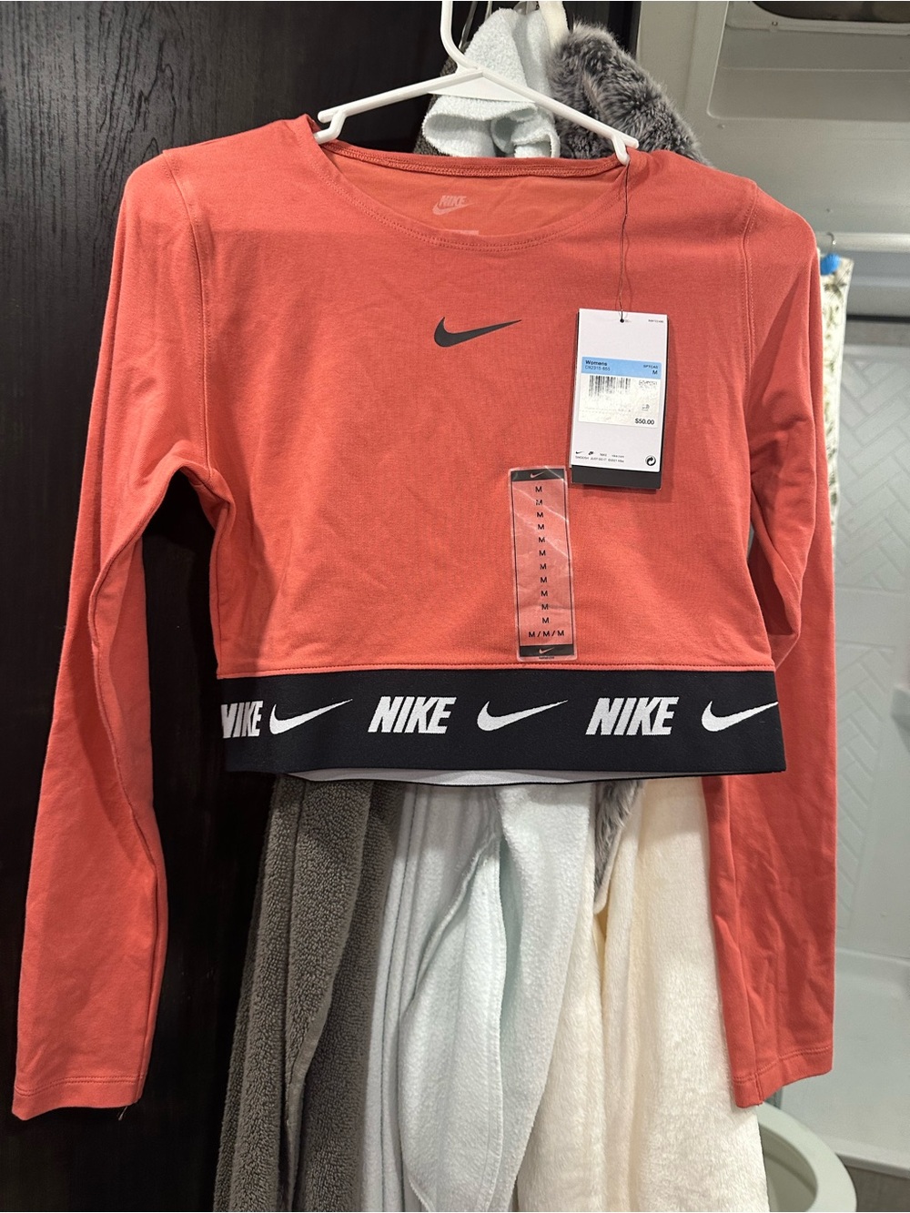 Nike Coral Long-Sleeve Cropped Logo Tee